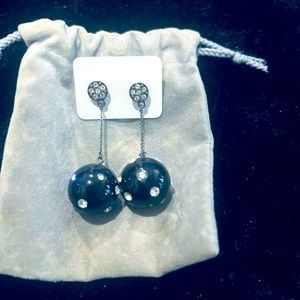 Earring black with small rein stones for pierced ears.